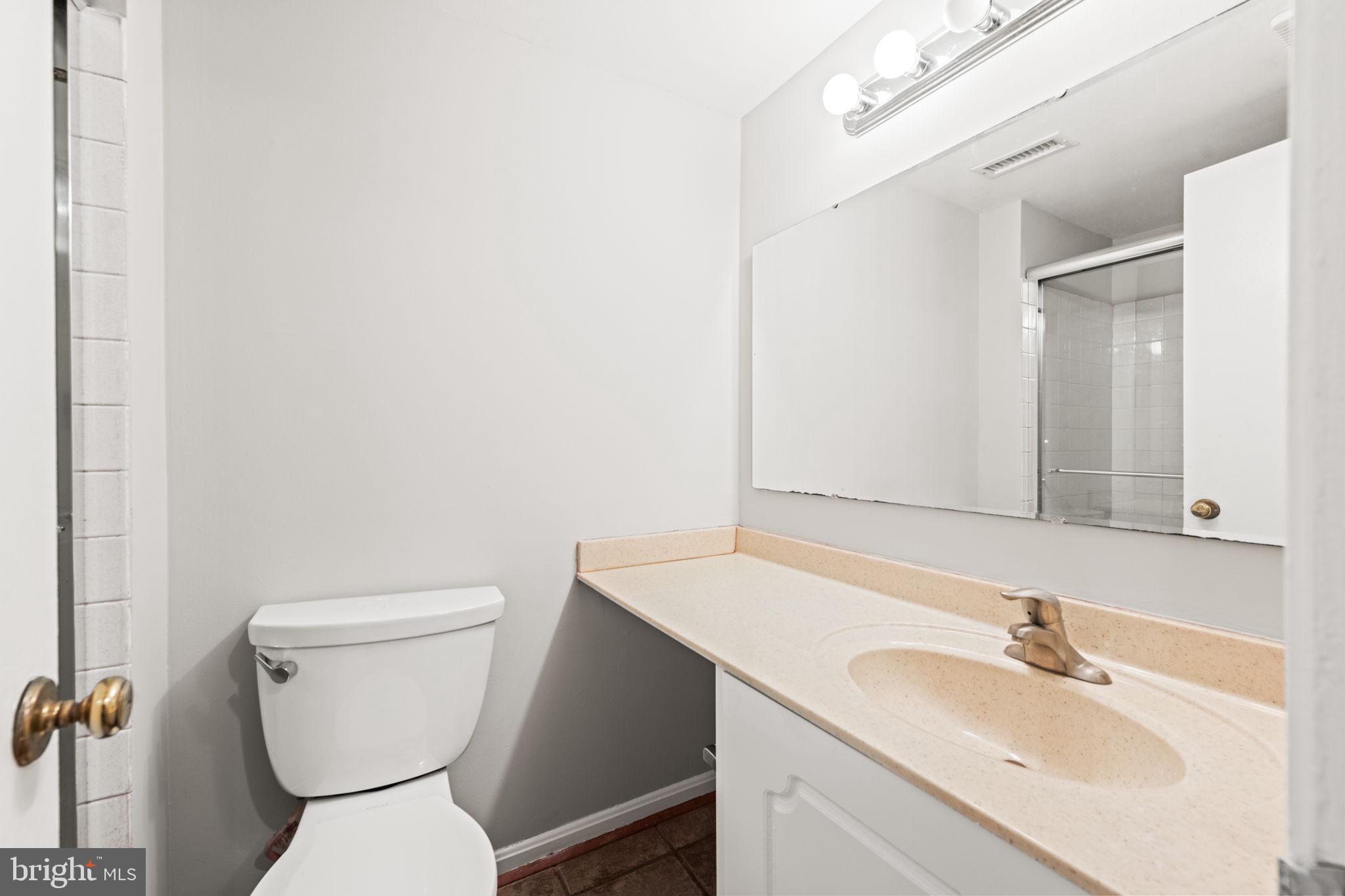 8000 Lady Lewis Court Springfield, VA 22153 - Photo 35 of 44 a bathroom with a sink and a toilet