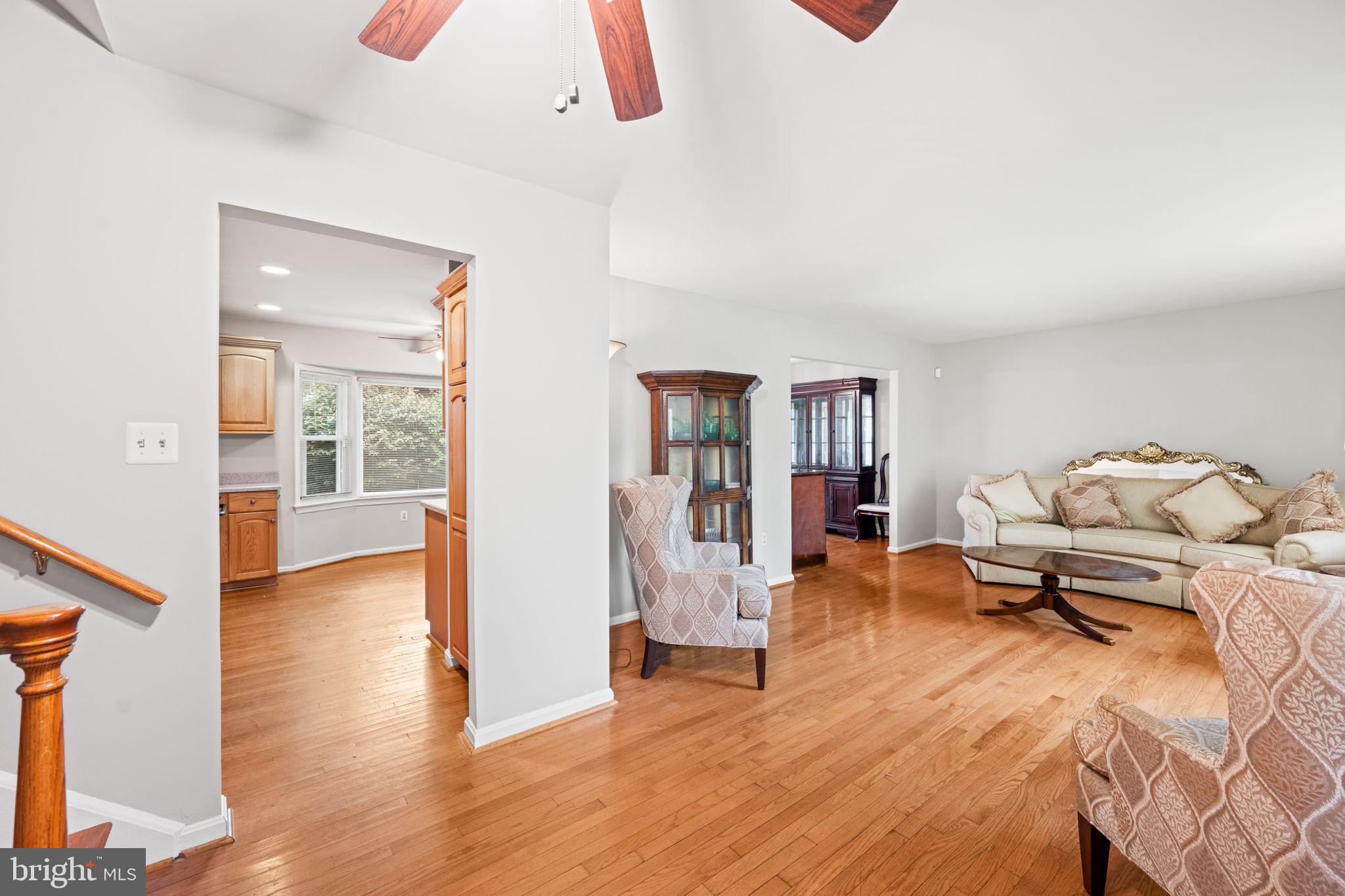 8000 Lady Lewis Court Springfield, VA 22153 - Photo 4 of 44 a living room with furniture and wooden floor