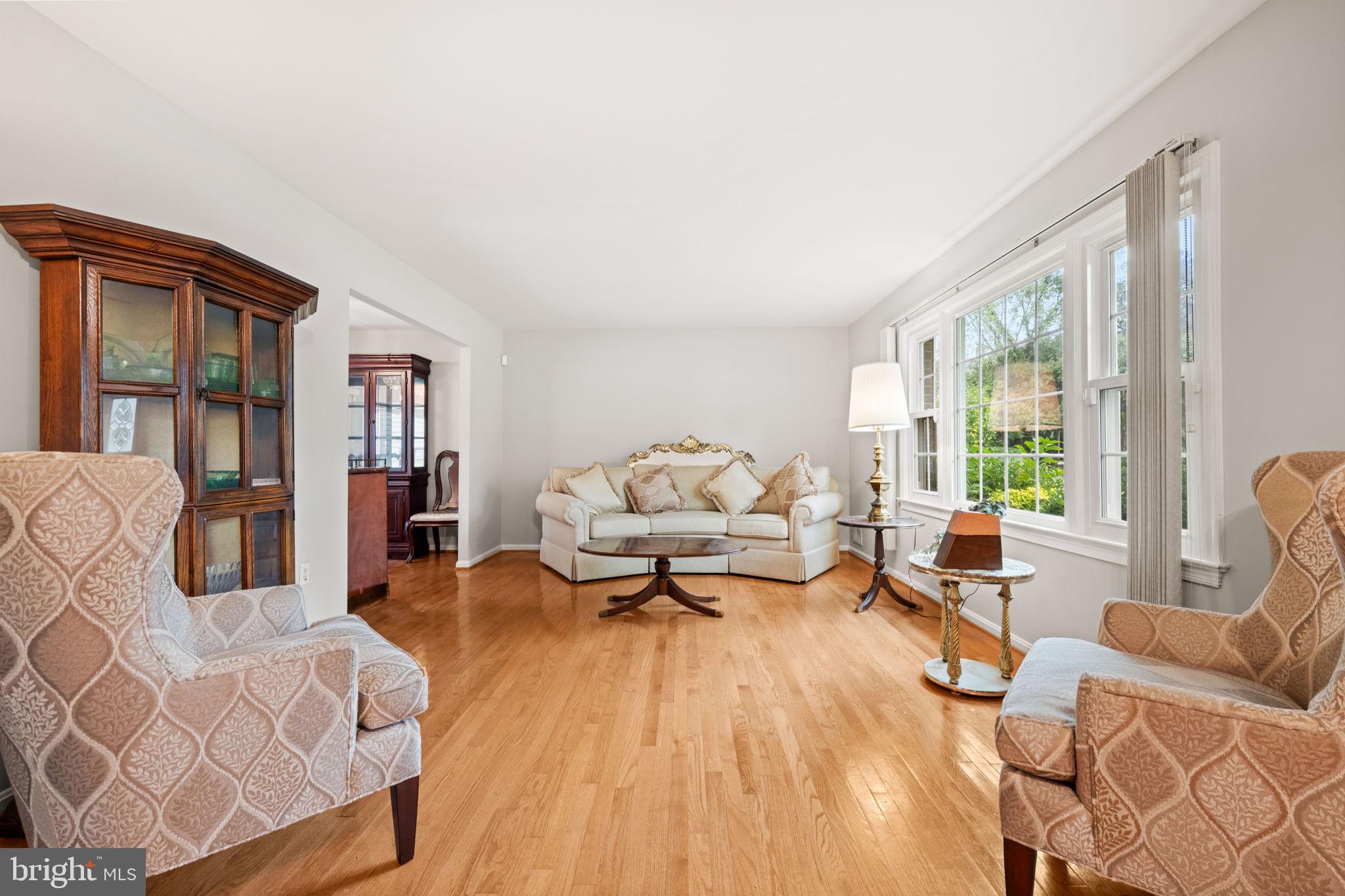 8000 Lady Lewis Court Springfield, VA 22153 - Photo 5 of 44 a living room with furniture and a large window