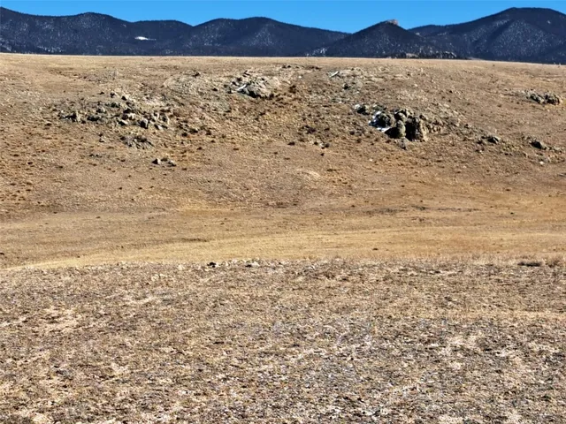 a view of ocean and mountain