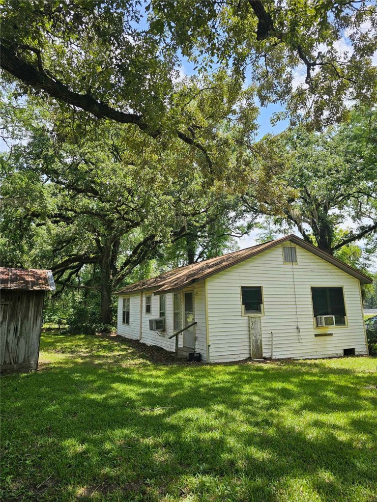 3961 Counts Road Point Blank, TX 77364 - Photo 3 of 9 a house view with a garden space