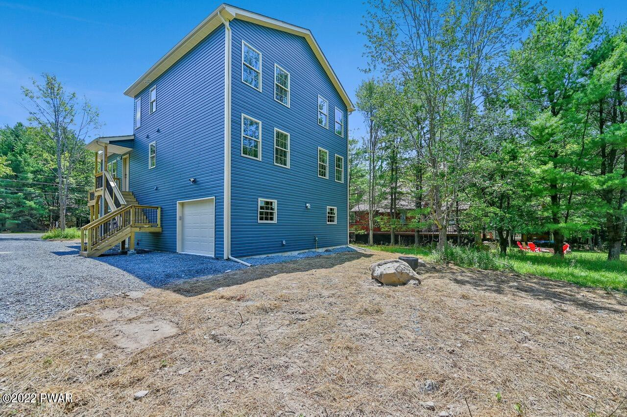 45 Rockway Road Lake Ariel, PA 18436 - Photo 54 of 65 a front view of a house with garden