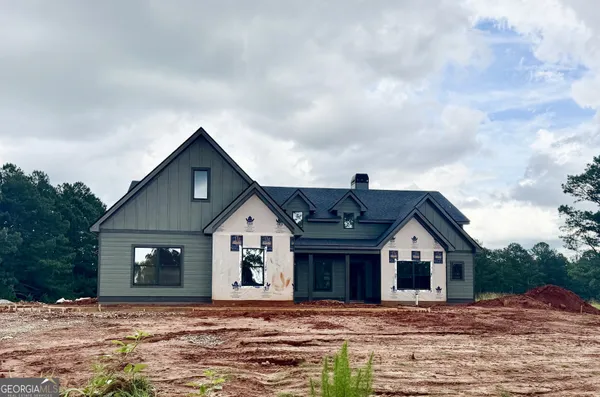 a view of houses with yard and kitchen view