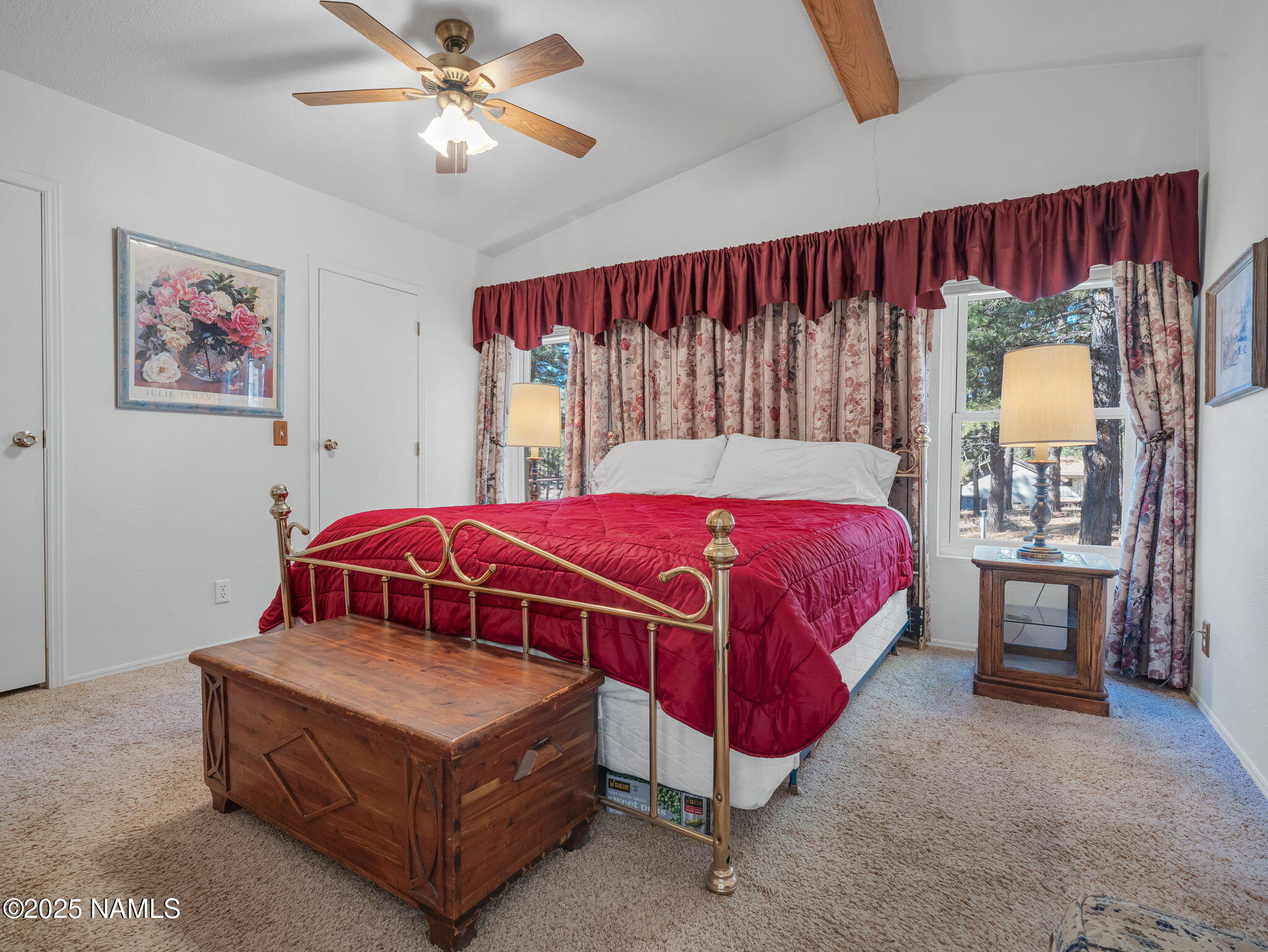 13112 Fallow Deer Road Parks, AZ 86018 - Photo 12 of 39 a bedroom with a bed and window