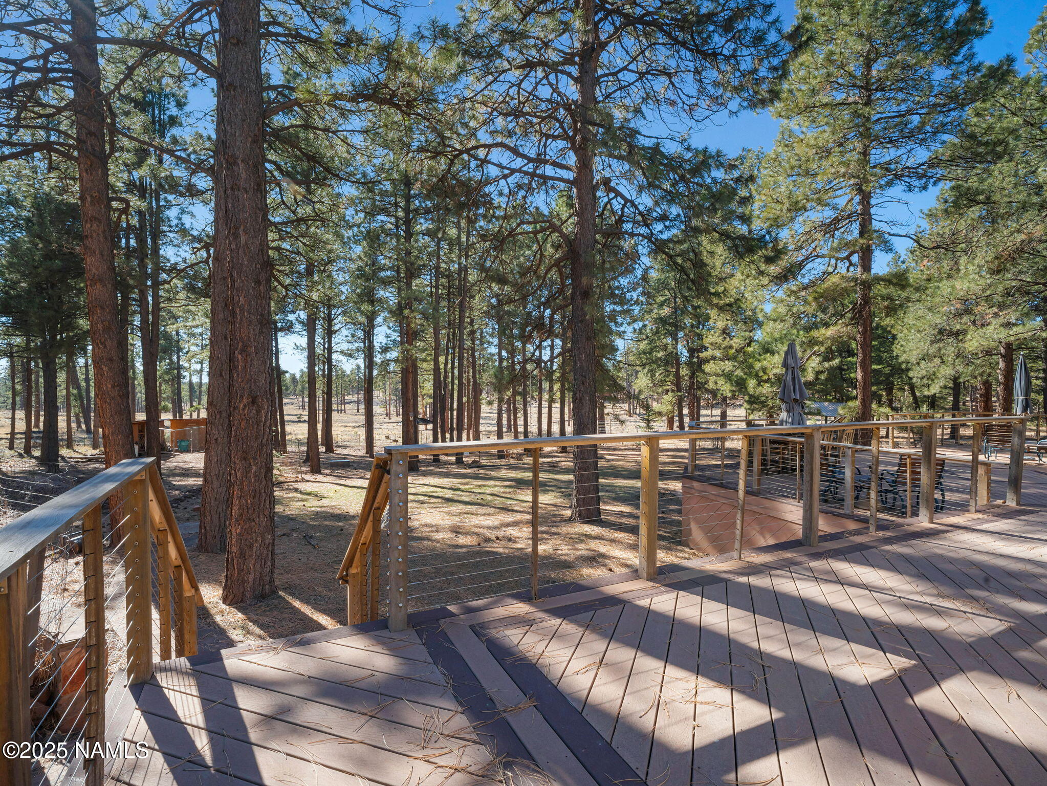 13112 Fallow Deer Road Parks, AZ 86018 - Photo 27 of 39 a view of a park with benches