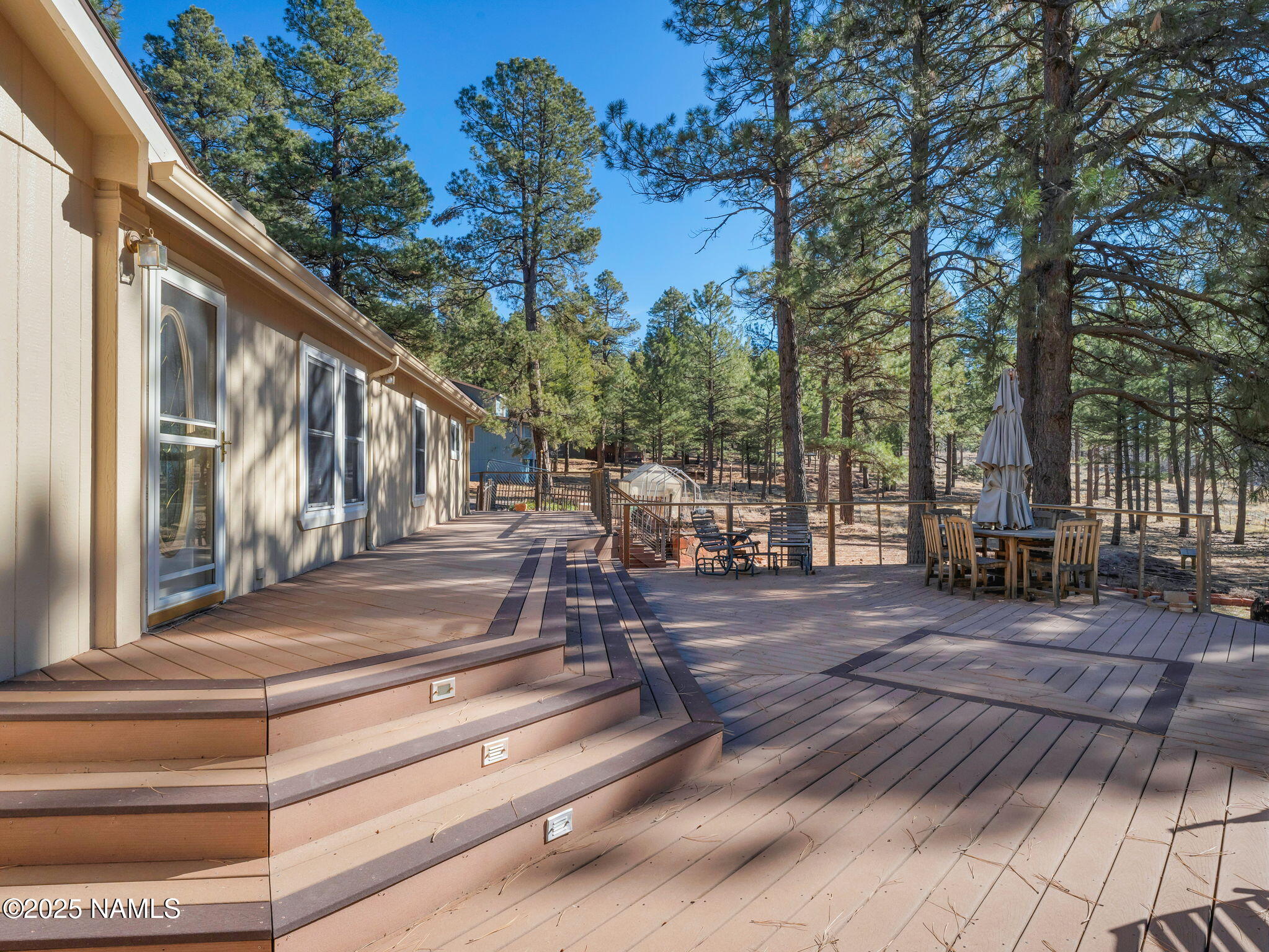 13112 Fallow Deer Road Parks, AZ 86018 - Photo 29 of 39 a view of house with outdoor space and sitting area
