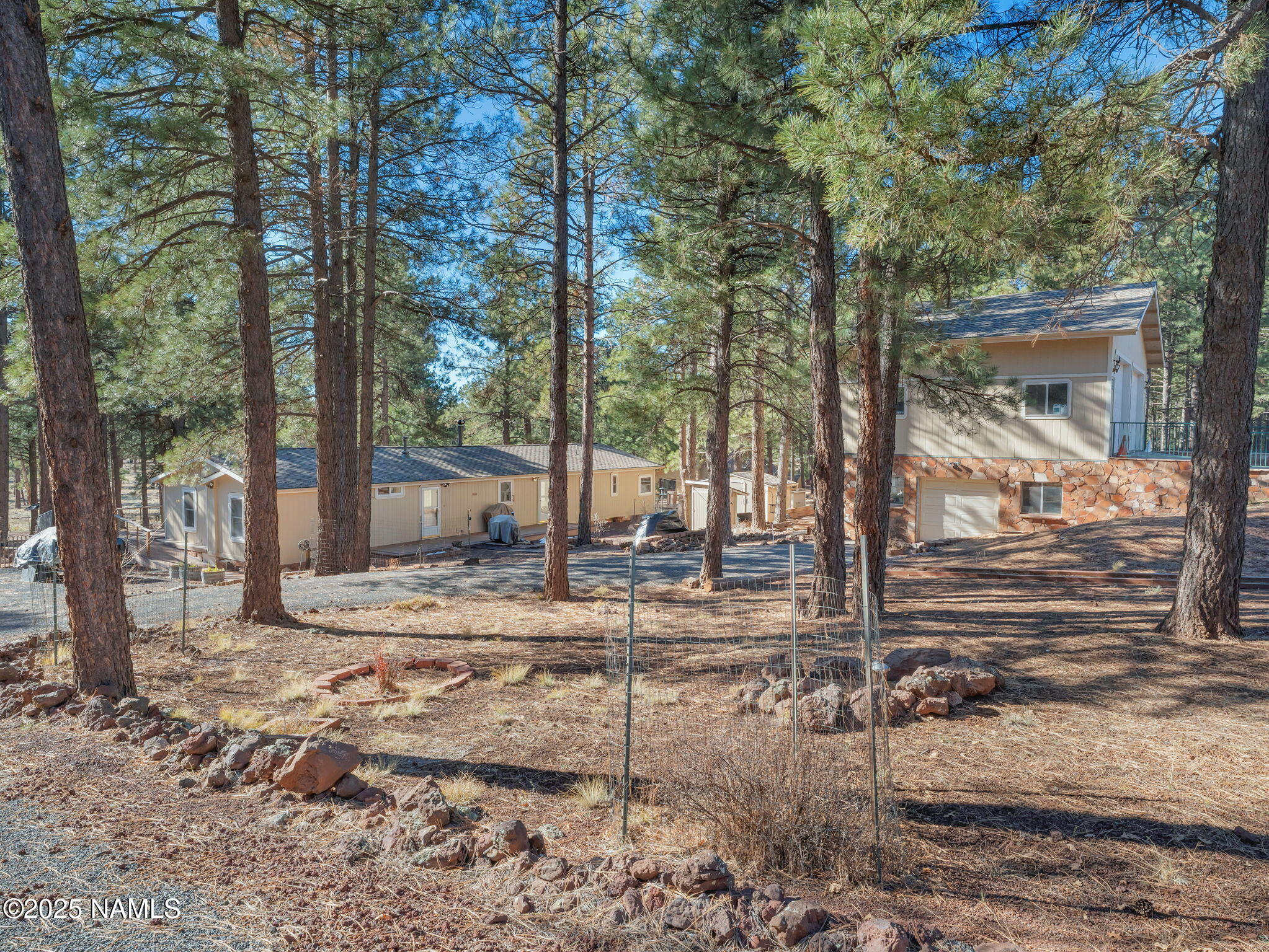 13112 Fallow Deer Road Parks, AZ 86018 - Photo 36 of 39 a view of a backyard of the house