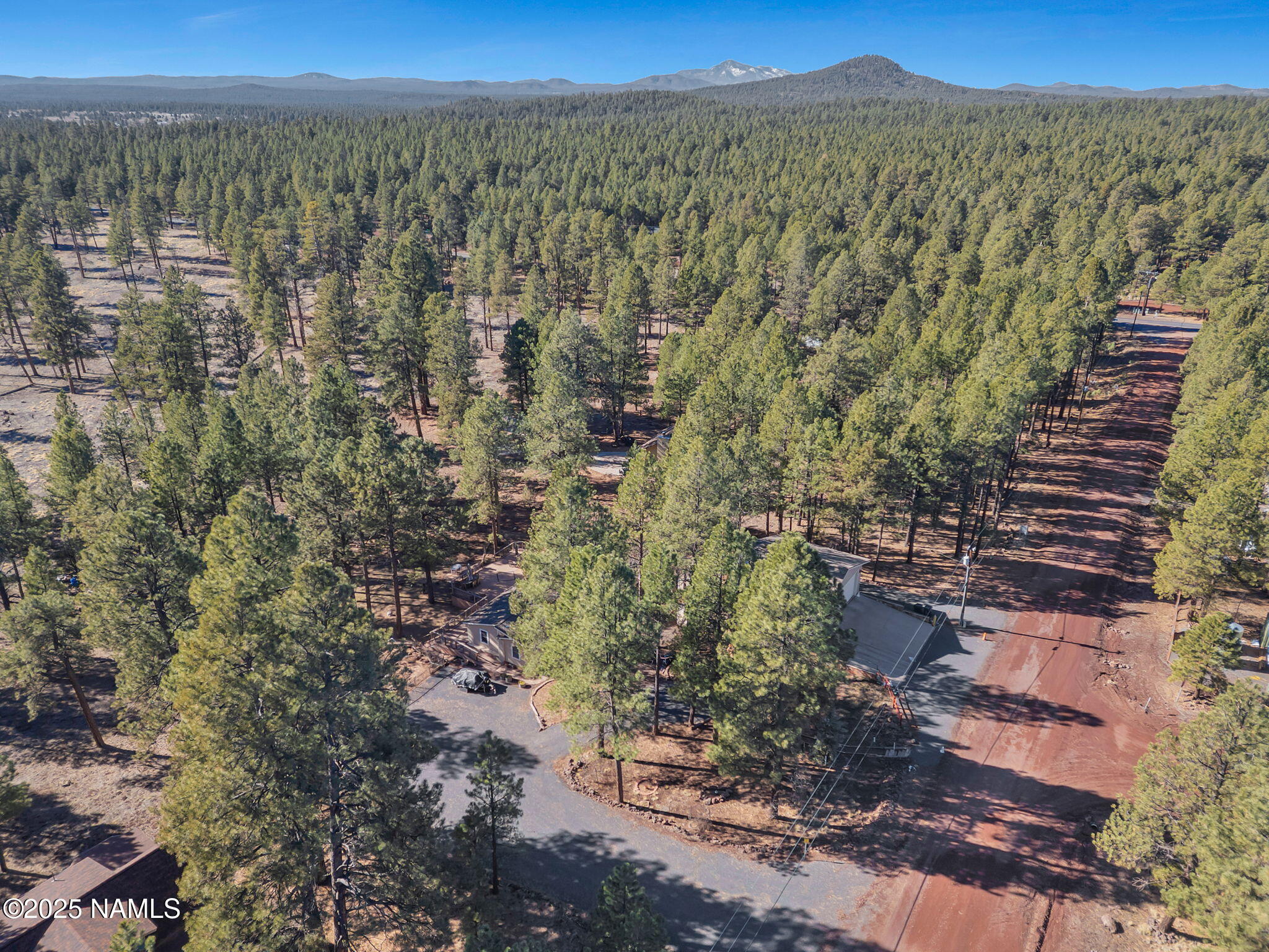 13112 Fallow Deer Road Parks, AZ 86018 - Photo 39 of 39 a view of a city with mountain