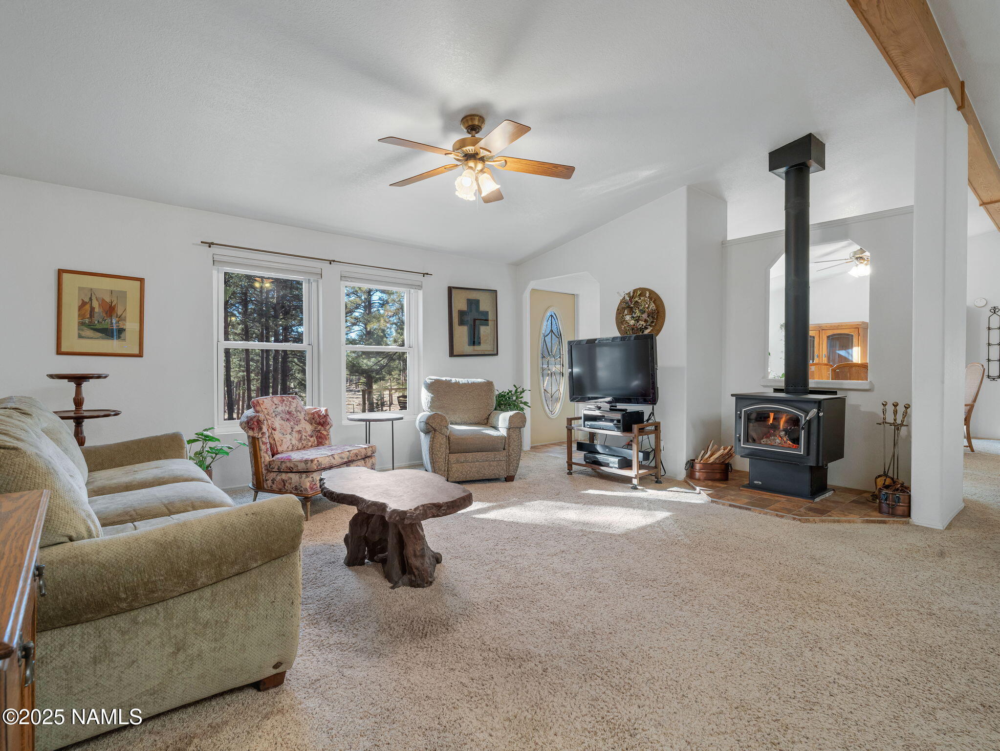 13112 Fallow Deer Road Parks, AZ 86018 - Photo 5 of 39 a living room with furniture and a large window