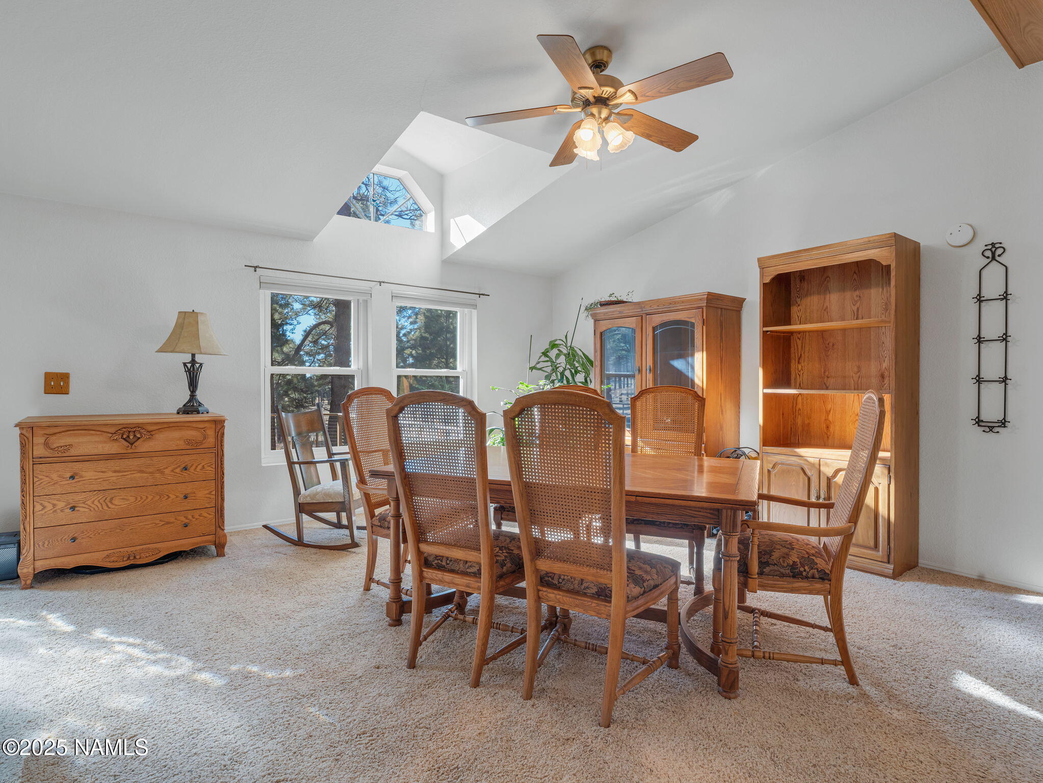 13112 Fallow Deer Road Parks, AZ 86018 - Photo 6 of 39 a dining room with furniture and window