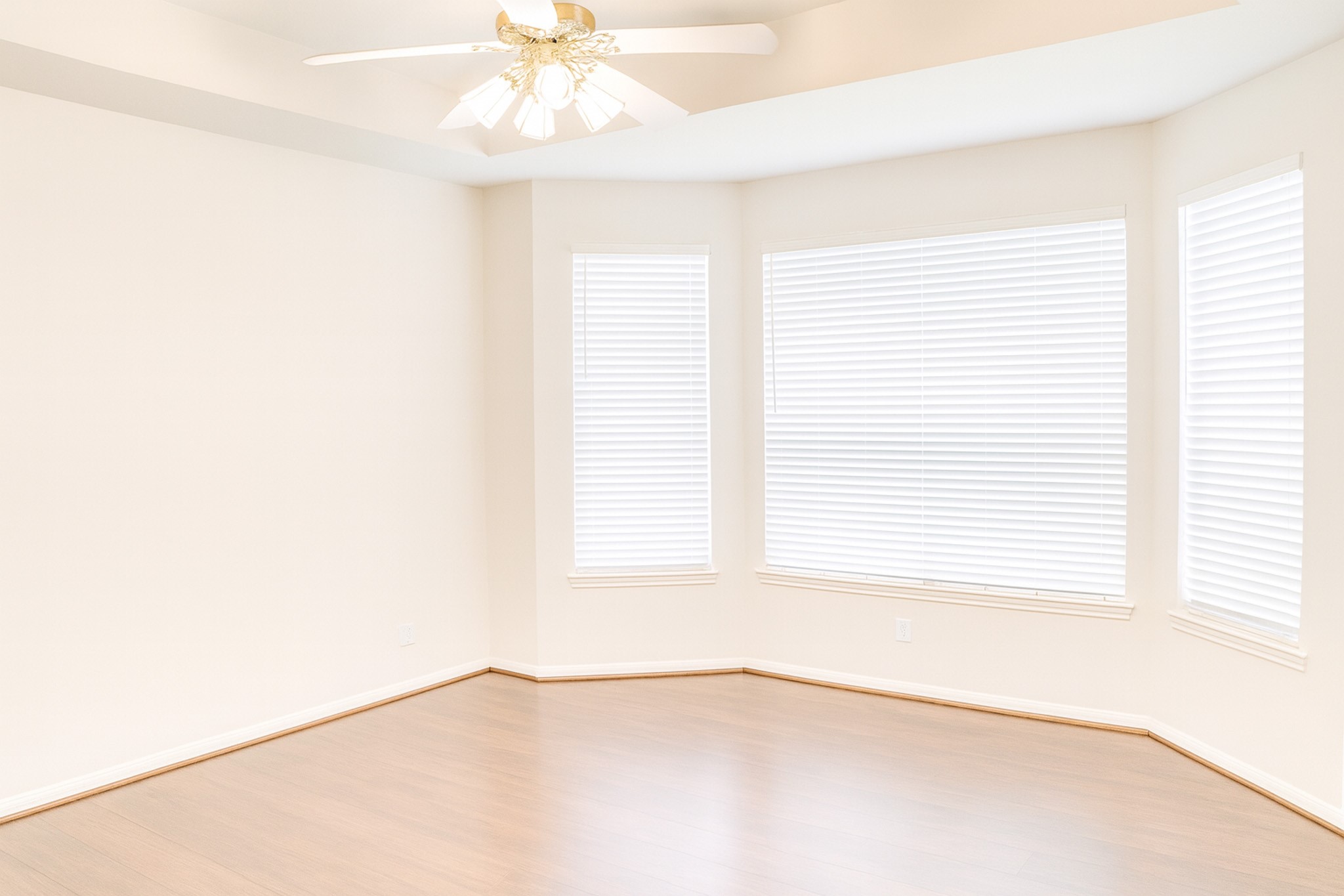 3306 Elmcrest Drive Houston, TX 77088 - Photo 11 of 19 an empty room with a window and a fan