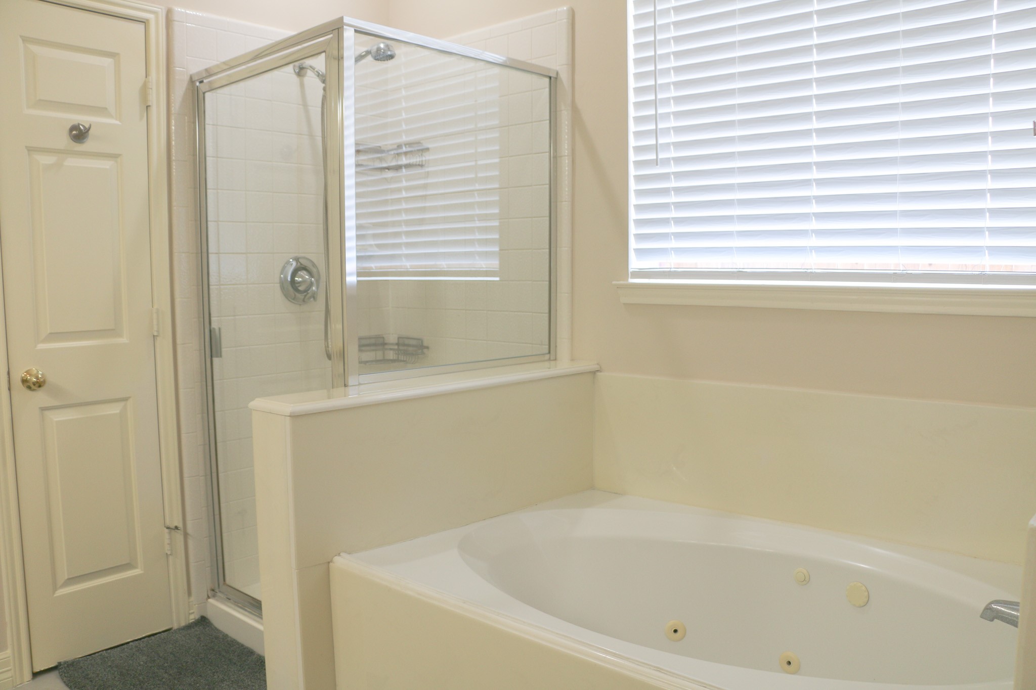 3306 Elmcrest Drive Houston, TX 77088 - Photo 12 of 19 a white bath tub sitting next to a window