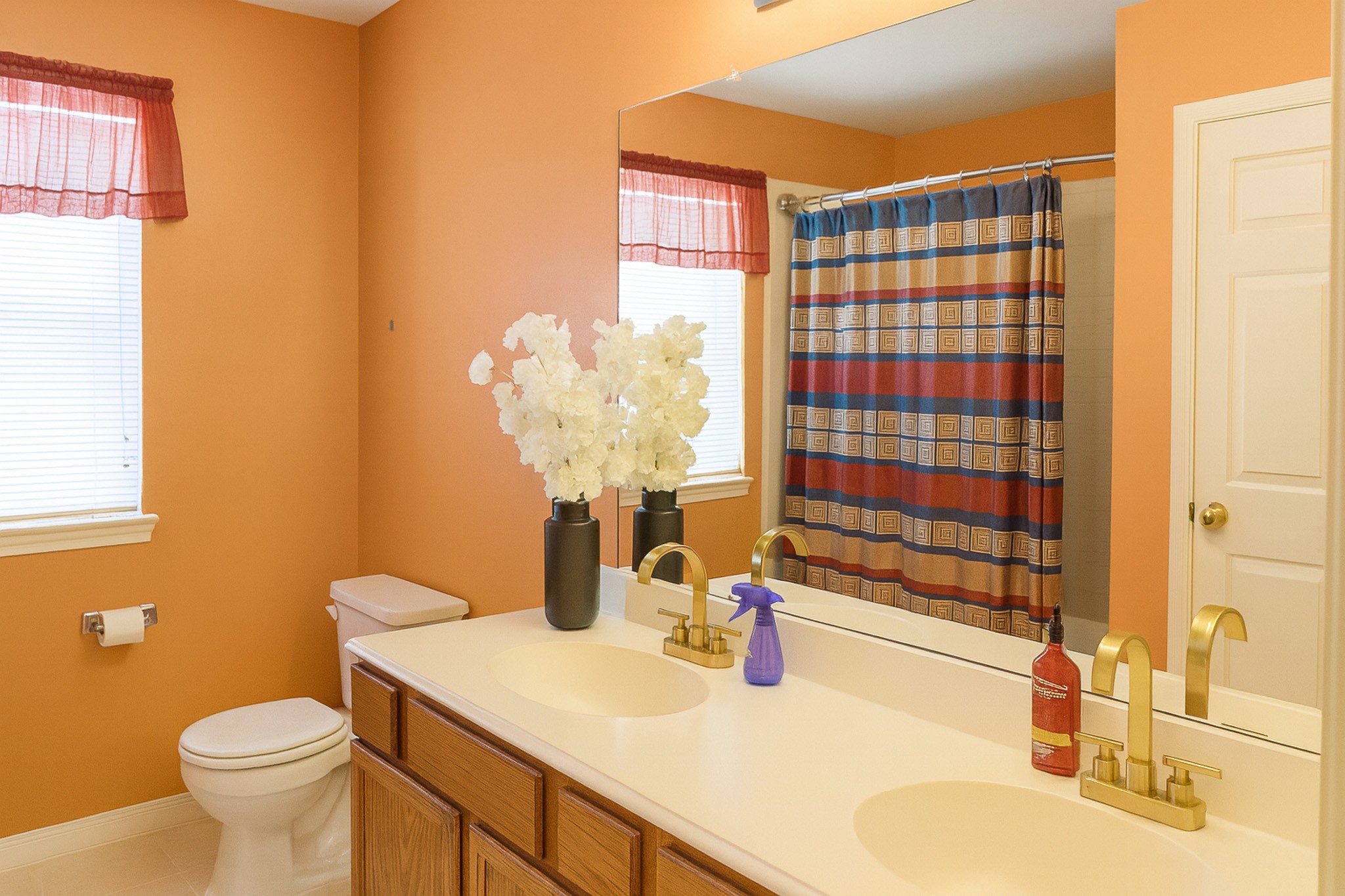 3306 Elmcrest Drive Houston, TX 77088 - Photo 17 of 19 a bathroom with a sink toilet and shower