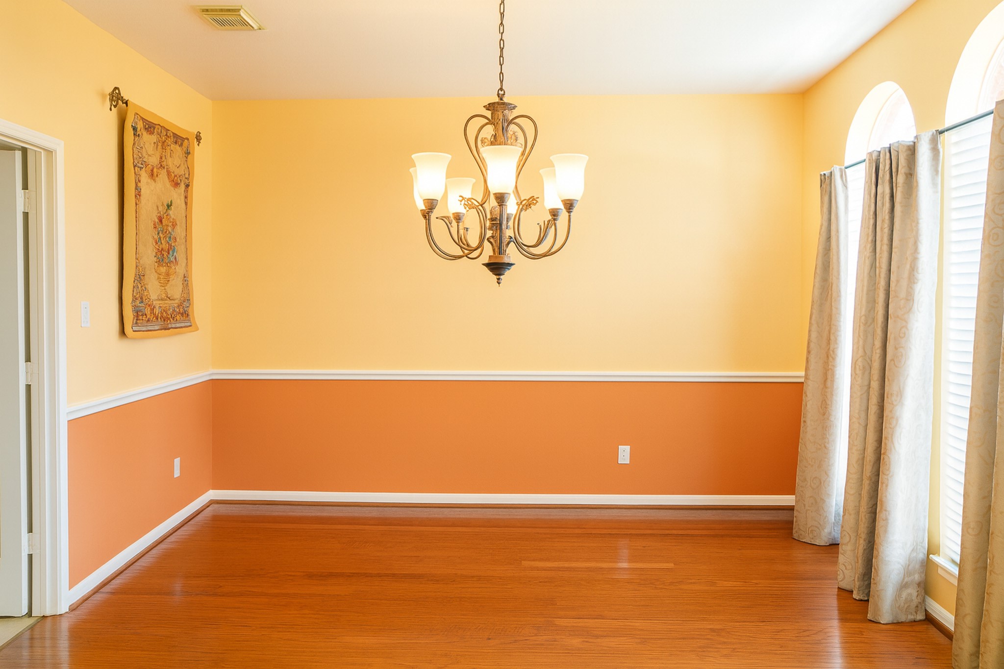 3306 Elmcrest Drive Houston, TX 77088 - Photo 8 of 19 a view of water heater room with wooden floor