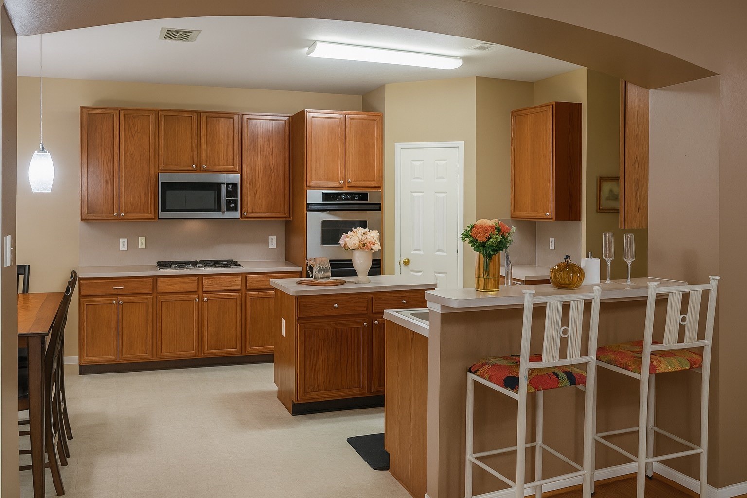 3306 Elmcrest Drive Houston, TX 77088 - Photo 9 of 19 a kitchen with a sink stove and microwave