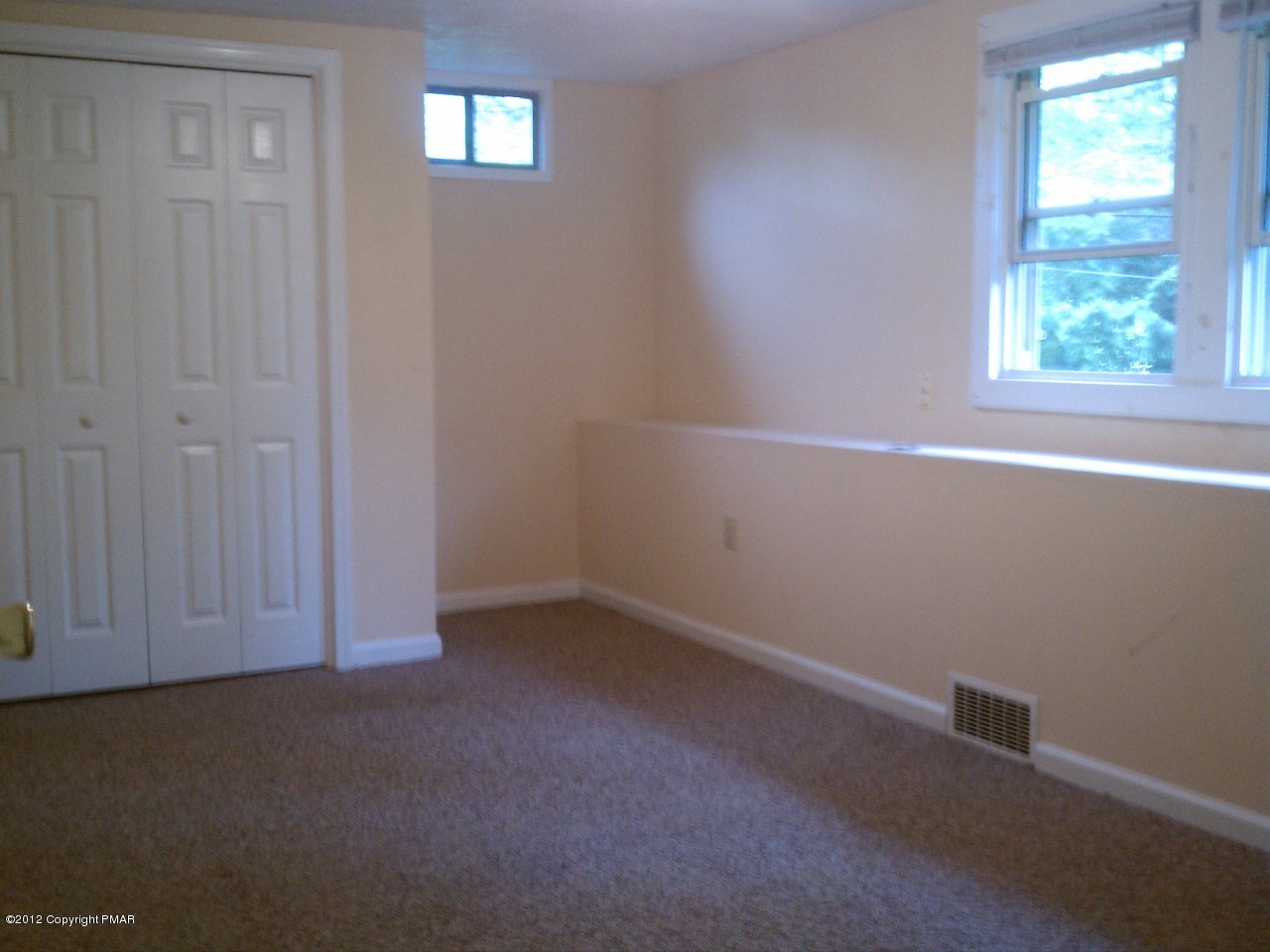 3 Intersection Hay Road Stroudsburg, PA 18360 - Photo 8 of 8 an empty room with a window