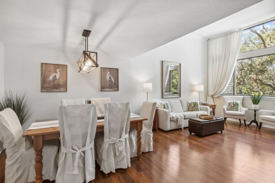 1163 Beach Walker Road, Unit 1163 Fernandina Beach, FL 32034 - Photo 13 of 58 a living room with furniture and wooden floor