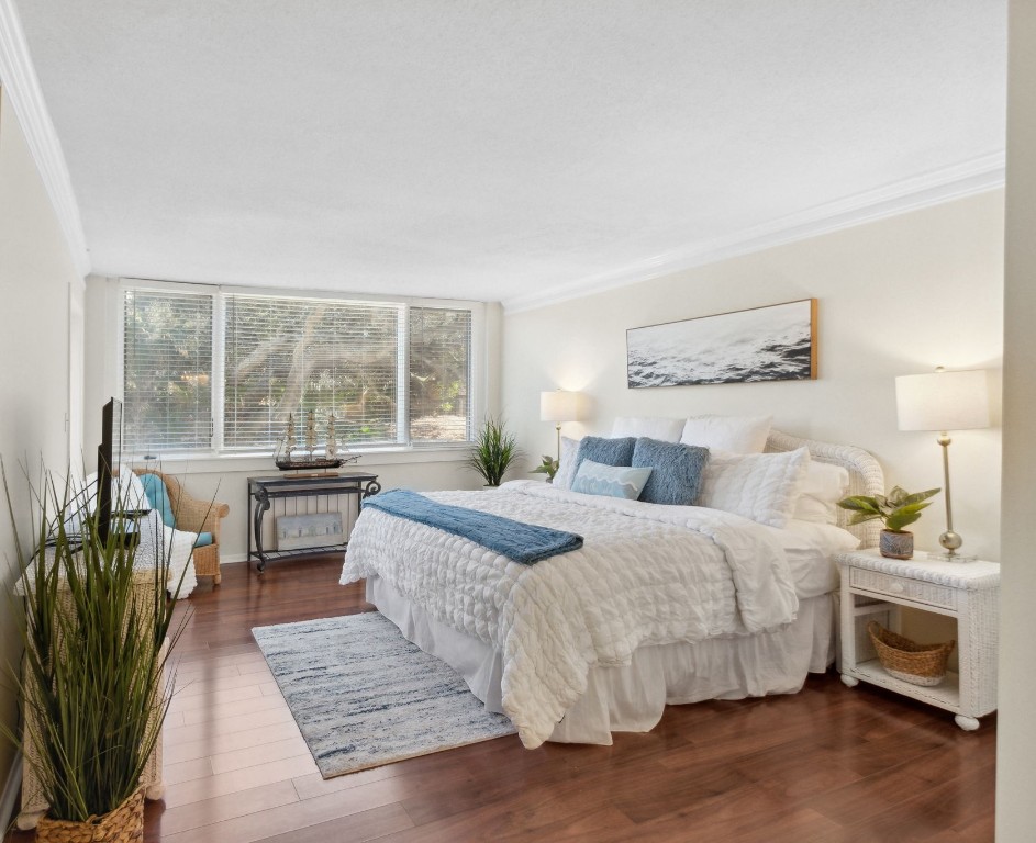 1163 Beach Walker Road, Unit 1163 Fernandina Beach, FL 32034 - Photo 30 of 58 a bedroom with a bed and a large window