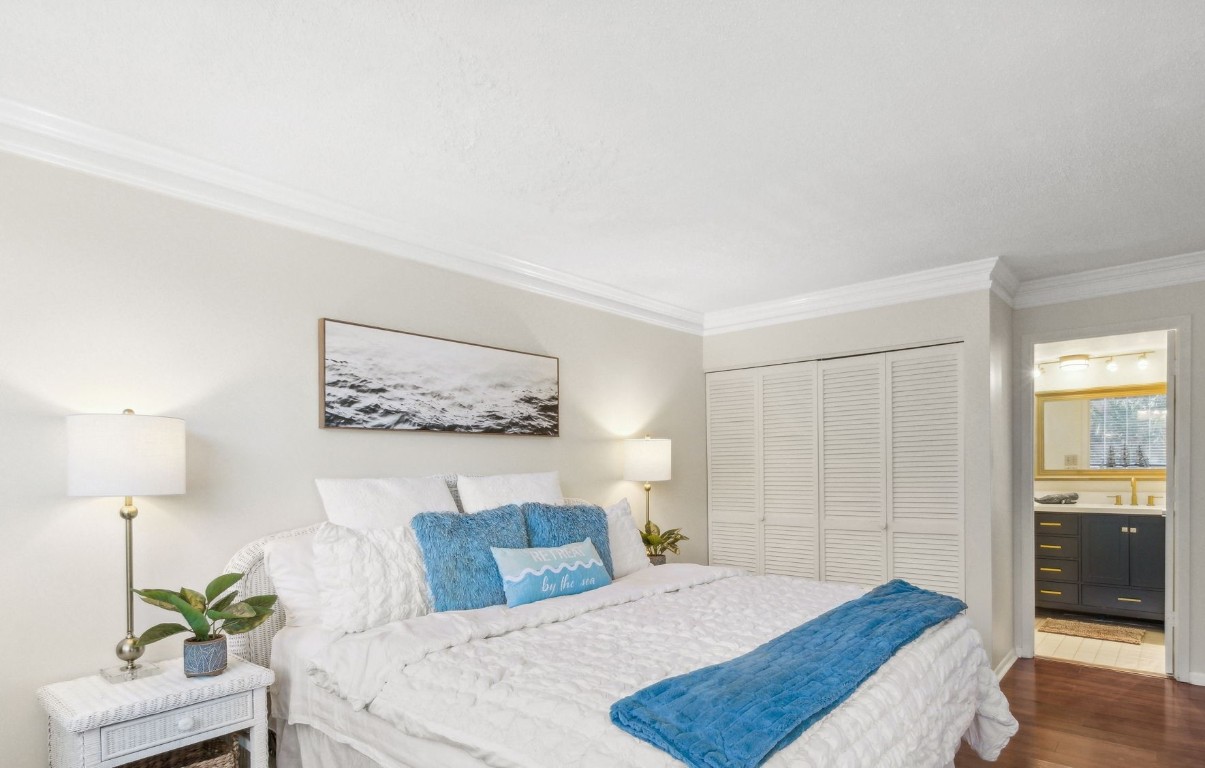 1163 Beach Walker Road, Unit 1163 Fernandina Beach, FL 32034 - Photo 32 of 58 a bed room with a bed and a couch