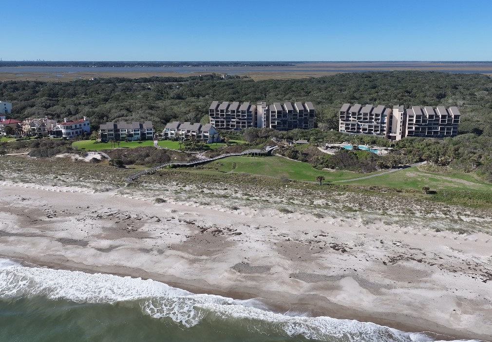 1163 Beach Walker Road, Unit 1163 Fernandina Beach, FL 32034 - Photo 34 of 58 a view of a dry yard with wooden floor and city view