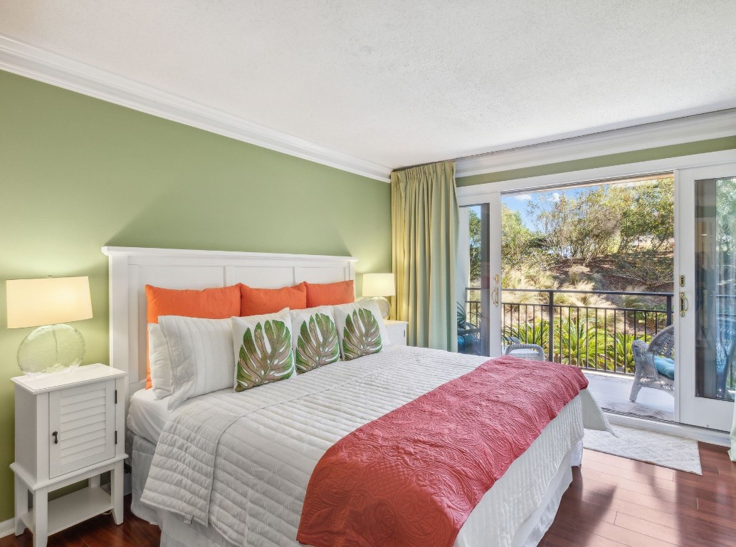 1163 Beach Walker Road, Unit 1163 Fernandina Beach, FL 32034 - Photo 4 of 58 a bedroom with a bed and a large window