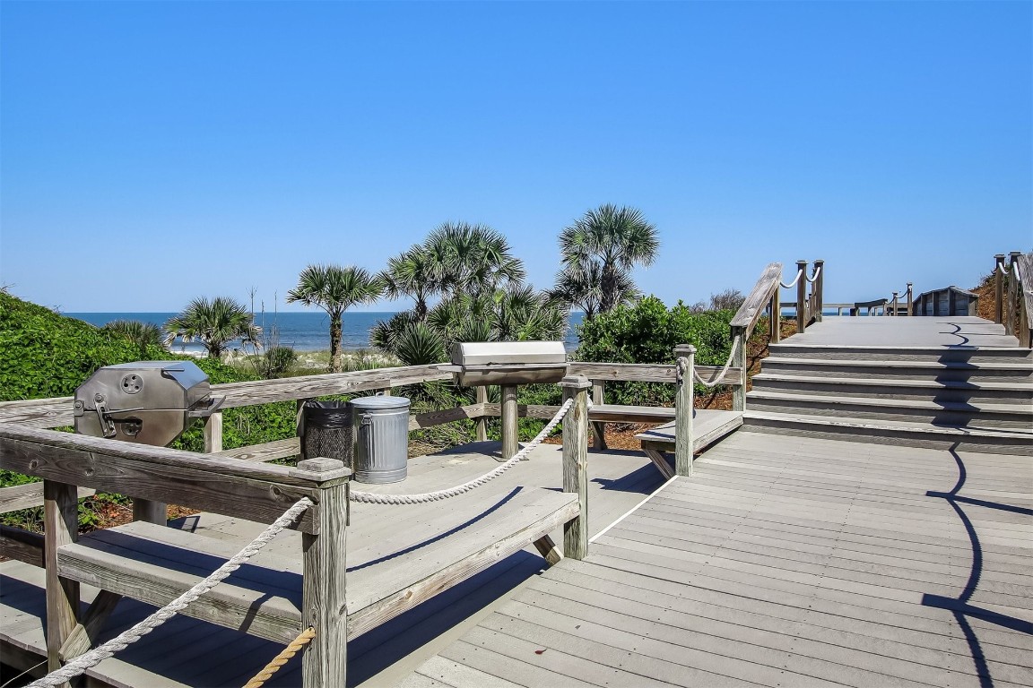 1163 Beach Walker Road, Unit 1163 Fernandina Beach, FL 32034 - Photo 45 of 58 a view of a balcony with chairs