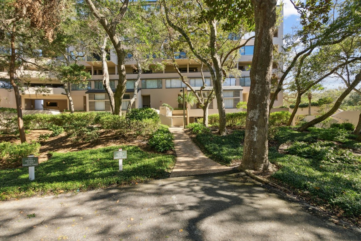 1163 Beach Walker Road, Unit 1163 Fernandina Beach, FL 32034 - Photo 9 of 58 front view of a house with a yard