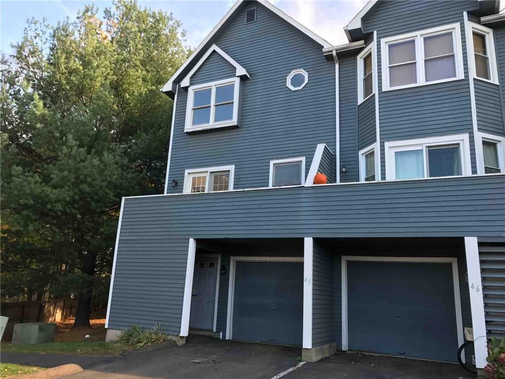 167 Old Foxon Road, Unit A45 New Haven, CT 06513 - Photo 1 of 1 a front view of a house with a yard