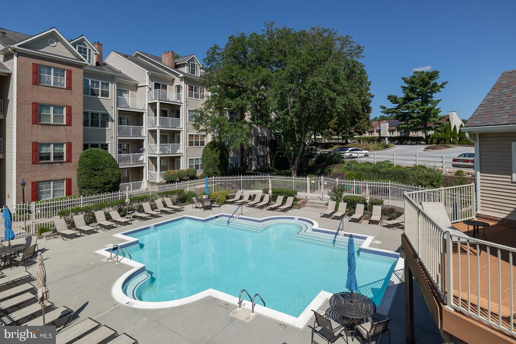 6832 I Hayley Ridge Way, Unit I Baltimore, MD 21209 - Photo 28 of 31 Sunny oasis with a sparkling pool.