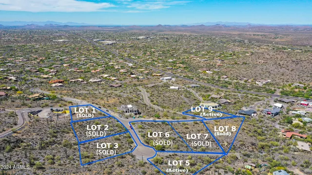 a view of a city with an ocean view