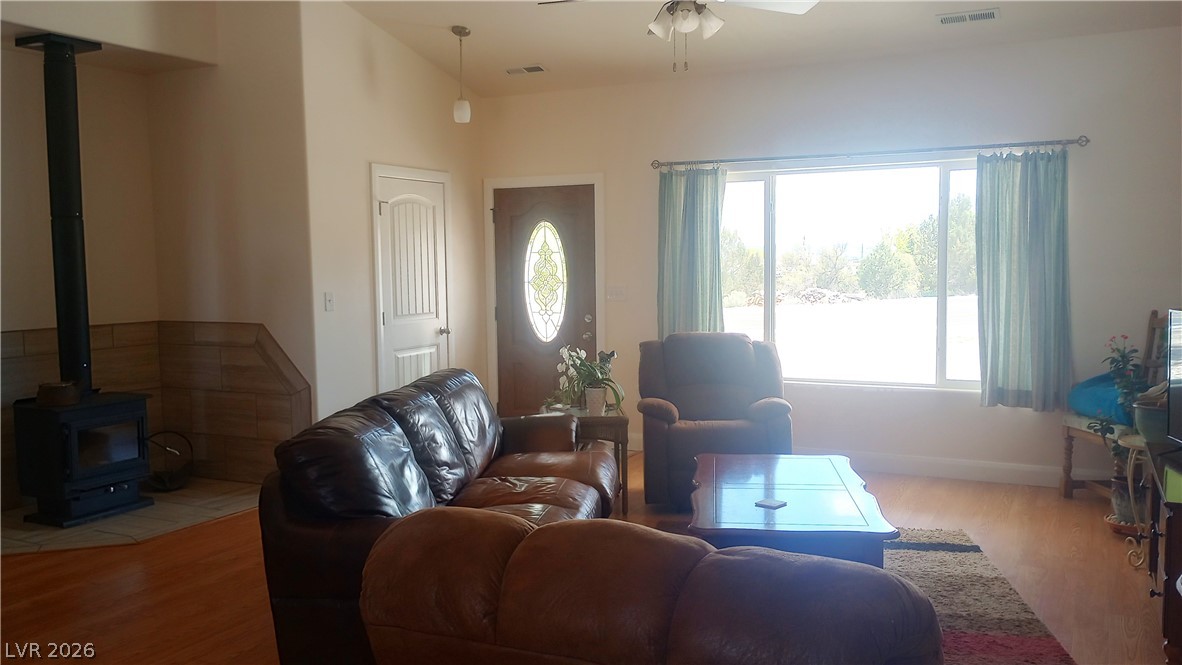 497 Airport Road Pioche, NV 89043 - Photo 6 of 20 Living area with Freestanding woodburning sove