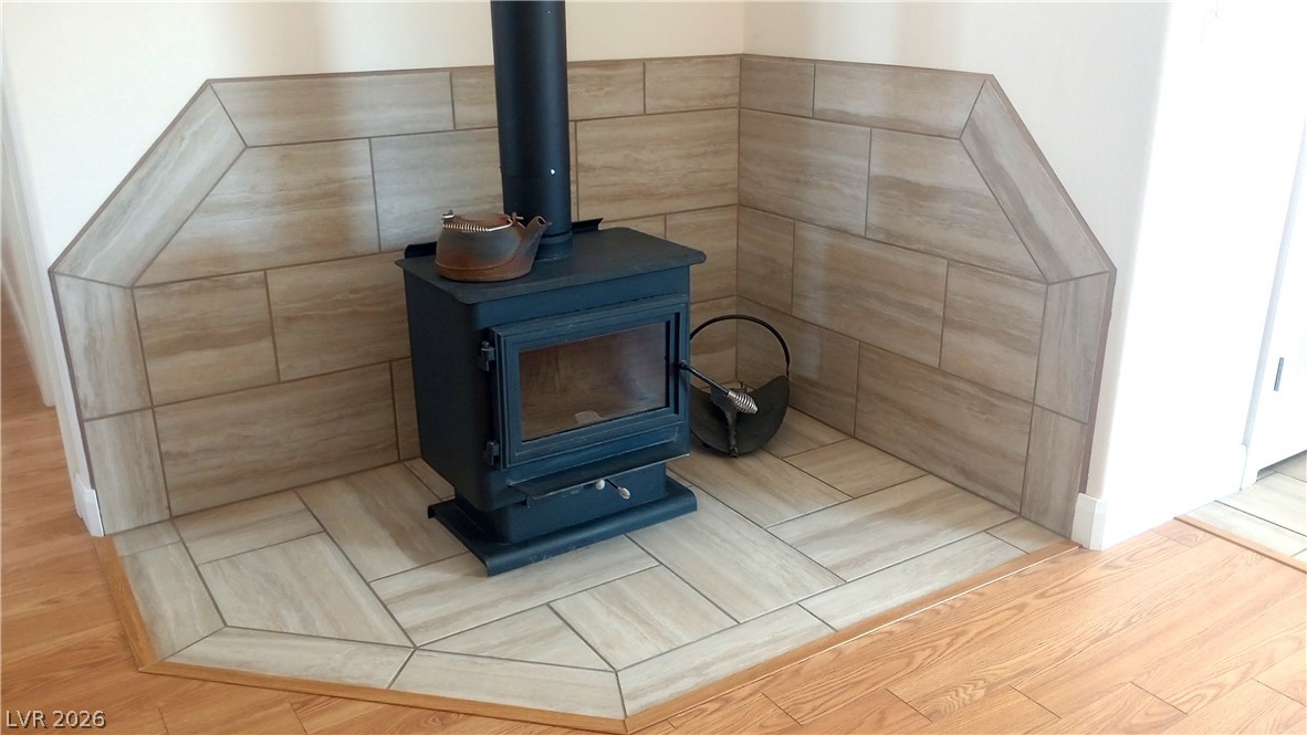 497 Airport Road Pioche, NV 89043 - Photo 7 of 20 Freestanding Glass door wood burning stove