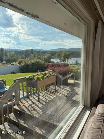 61 Tor Court Pittsfield, MA 01201 - Photo 23 of 32 a view of a balcony with wooden floor