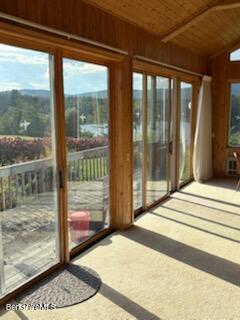 61 Tor Court Pittsfield, MA 01201 - Photo 8 of 32 a bedroom with a bed and glass door