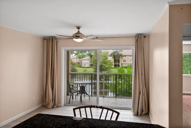 a view of a porch with a floor to ceiling window