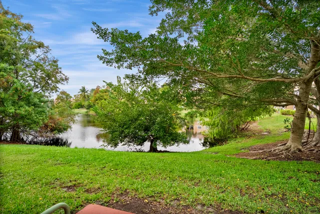 an aerial view of lake residential houses with outdoor space
