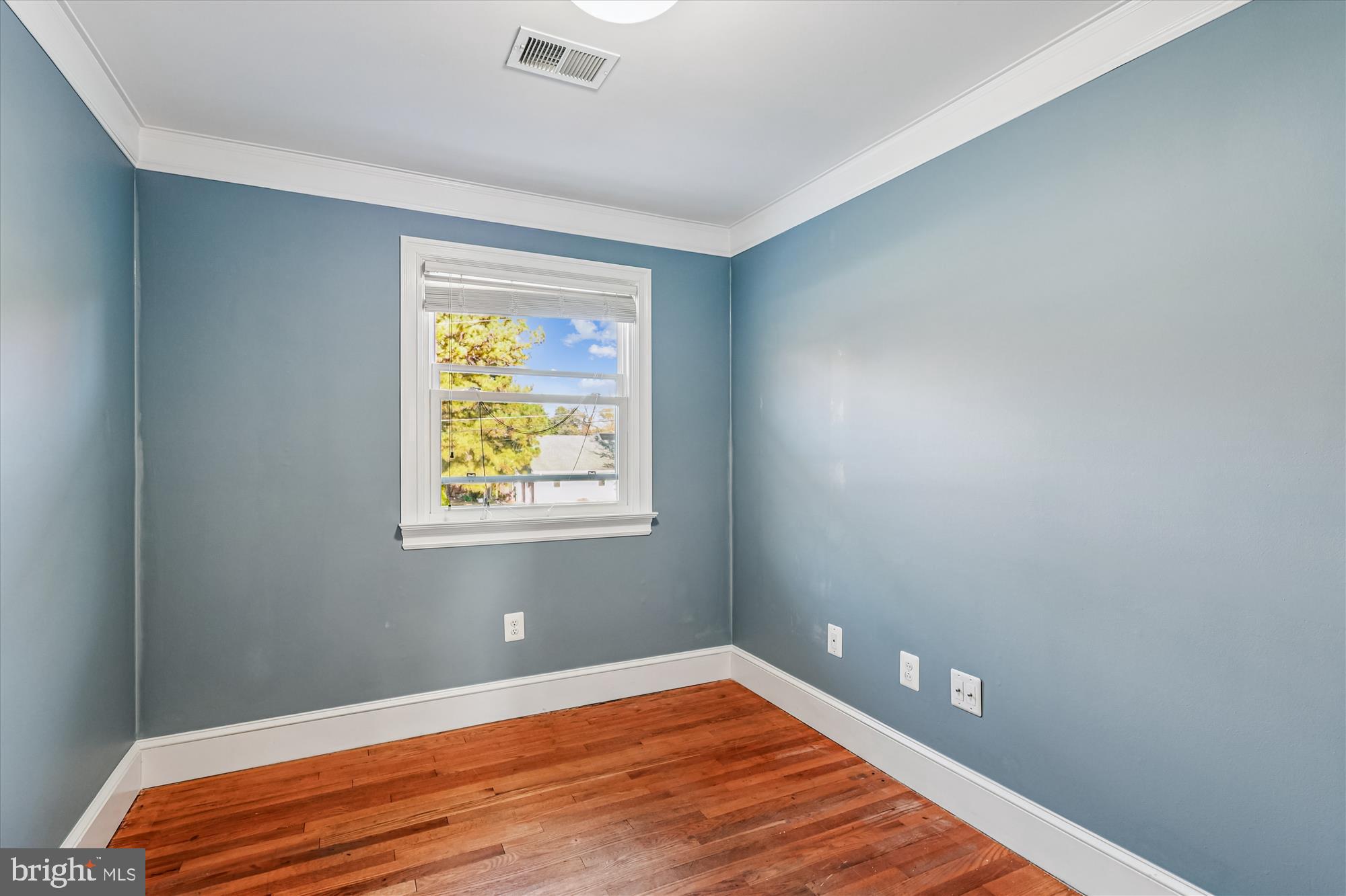 1506 Widows Mite Road Edgewater, MD 21037 - Photo 14 of 66 a bedroom with bed and window