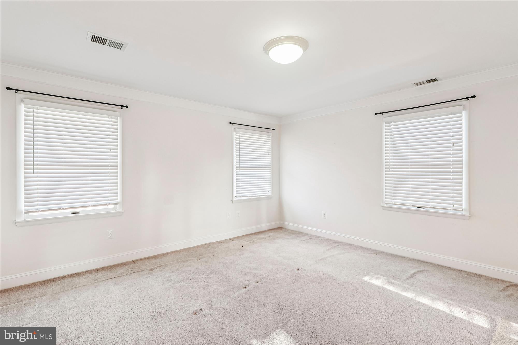 1506 Widows Mite Road Edgewater, MD 21037 - Photo 47 of 66 a view of an empty room with a window
