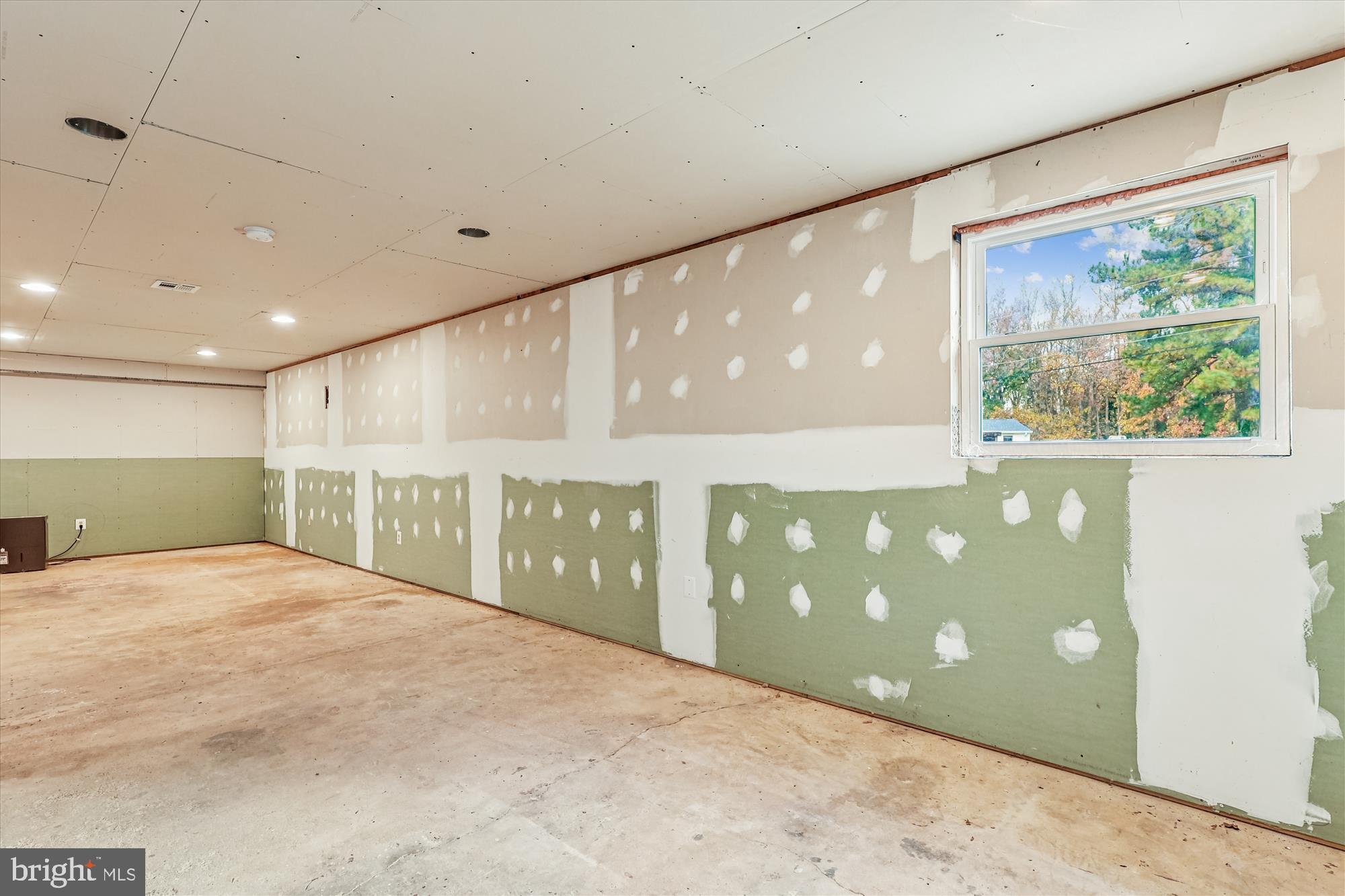 1506 Widows Mite Road Edgewater, MD 21037 - Photo 57 of 66 a view of an empty room with a window