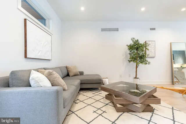 a kitchen with a stove and a white cabinets
