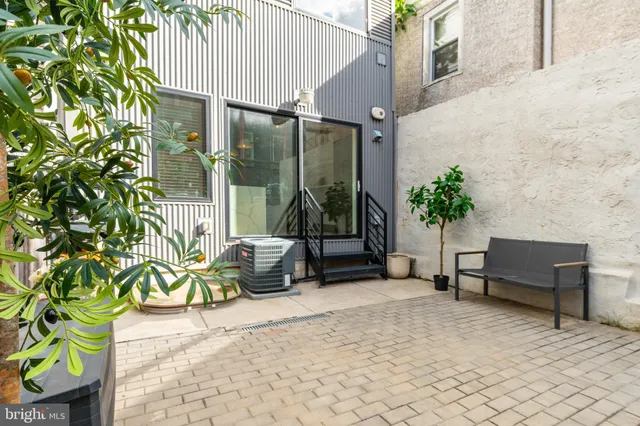 a view of a hallway with washer and dryer