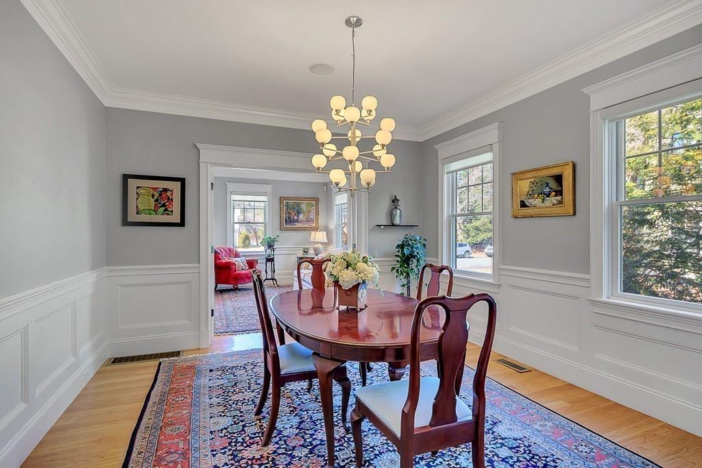 33 Everett Street Concord, MA 01742 - Photo 14 of 42 a view of a dining room with furniture window and wooden floor