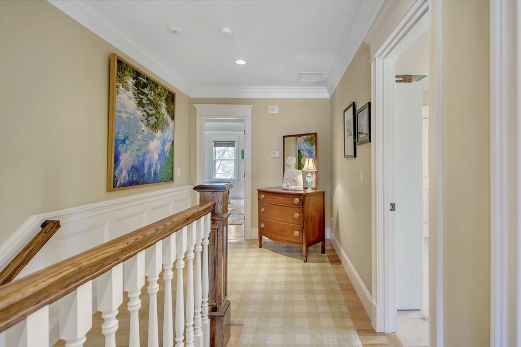 33 Everett Street Concord, MA 01742 - Photo 25 of 42 a view of a hallway with a workspace