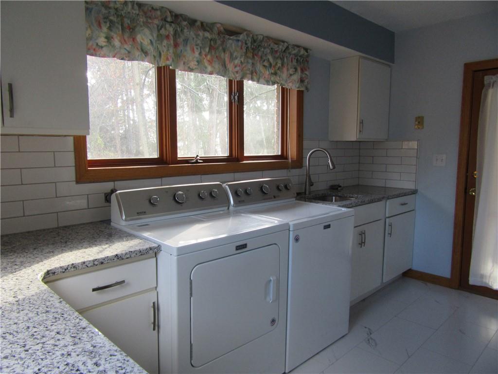 414 Klein Road Rochester, PA 15074 - Photo 15 of 37 a view of a kitchen sink microwave and cabinets