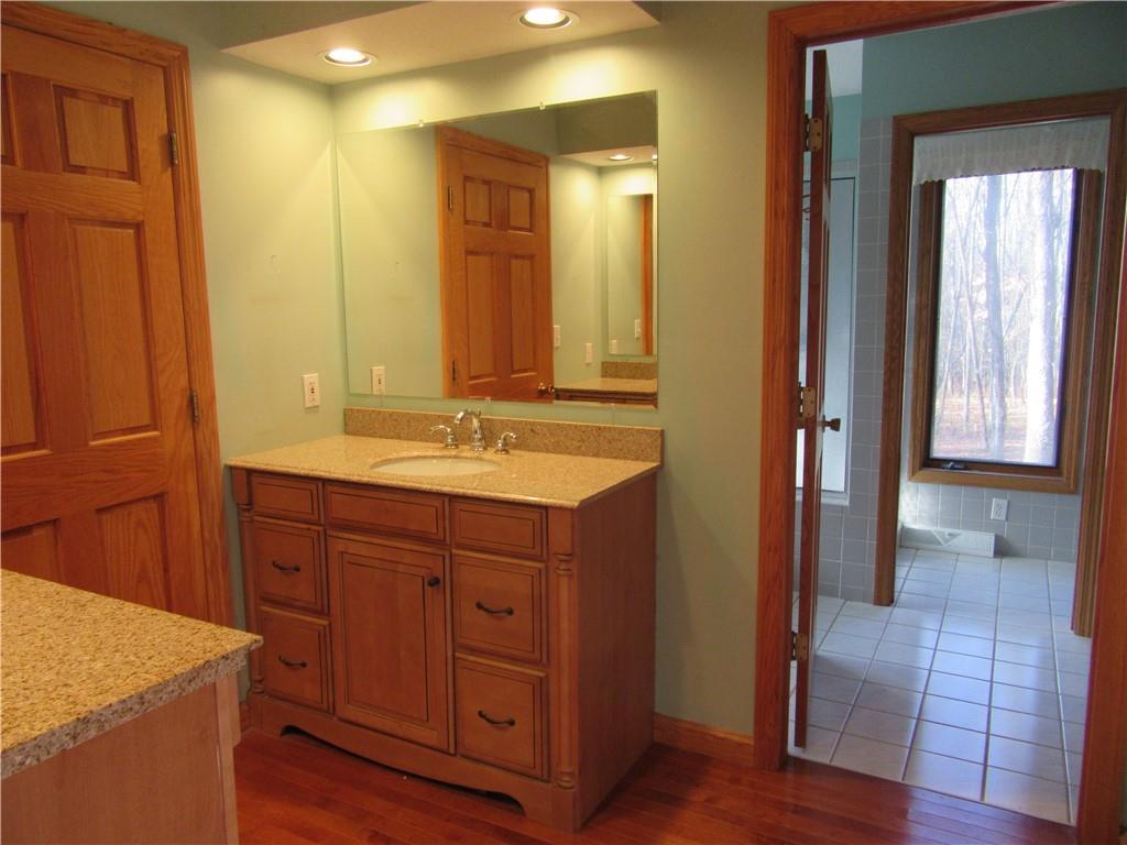 414 Klein Road Rochester, PA 15074 - Photo 18 of 37 a bathroom with a sink and a mirror