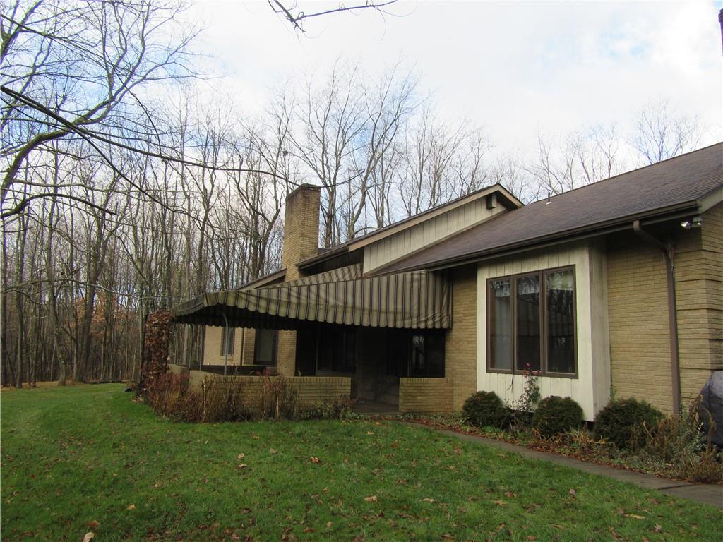 414 Klein Road Rochester, PA 15074 - Photo 3 of 37 a view of a house with a yard and sitting area