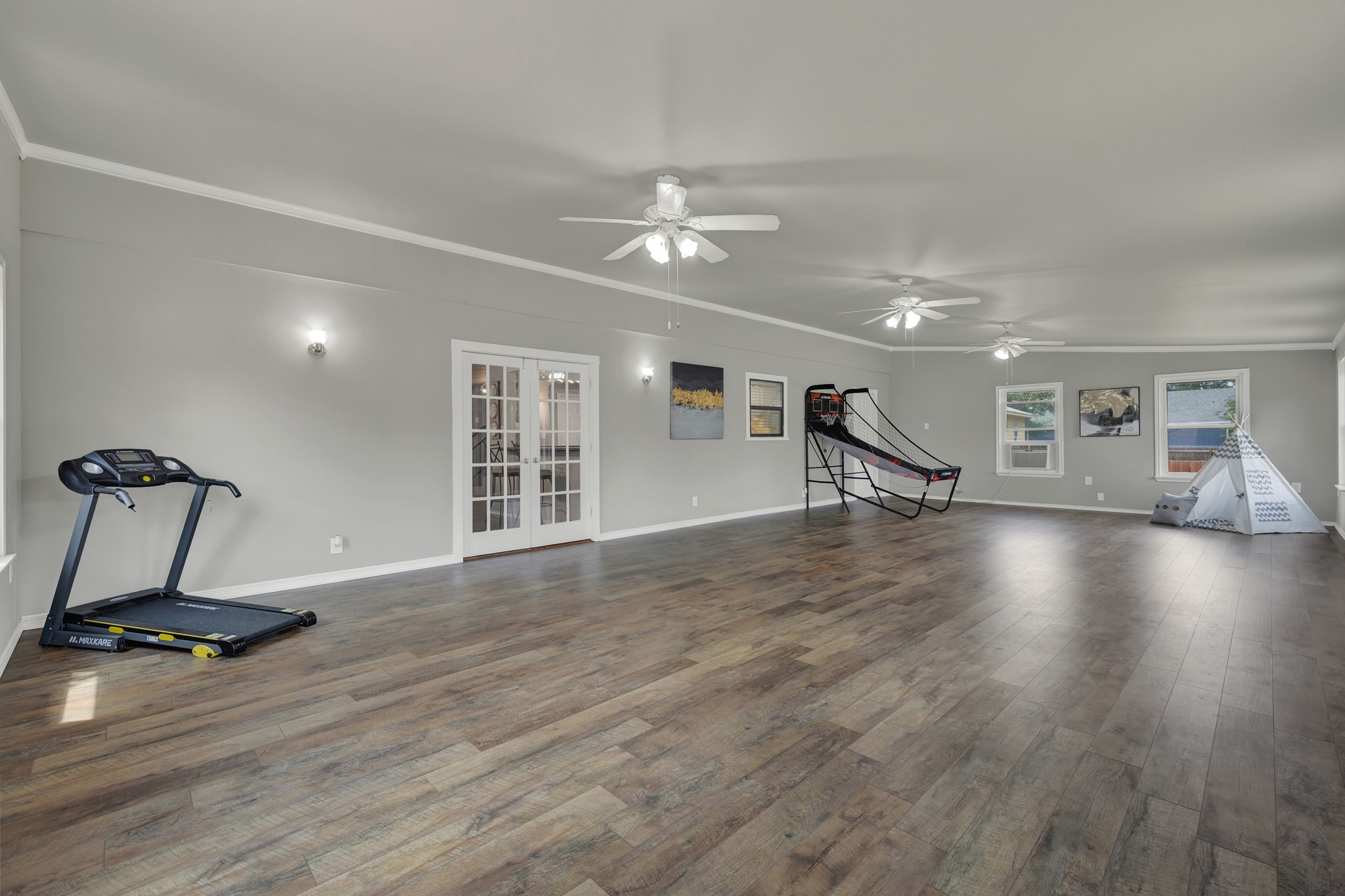 580 East Zipp Road New Braunfels, TX 78130 - Photo 11 of 45 If a downstairs Primary Bedroom is on the list- this is Space to transform. And Its 20x40!!