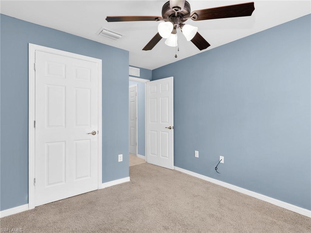 731 Hadley Place West Naples, FL 34104 - Photo 10 of 30 Bedroom 4 With Ceiling Fan and Closet