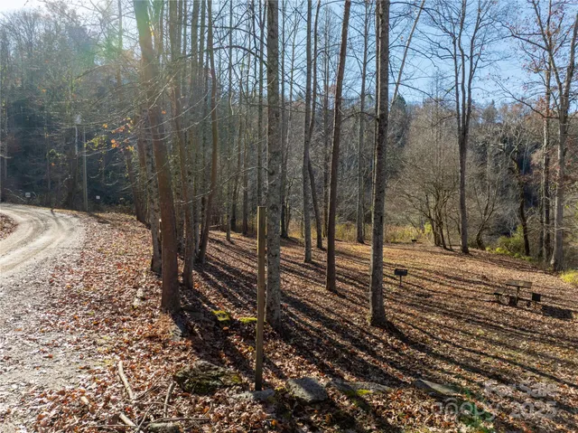 a view of balcony with wooden floor and yard