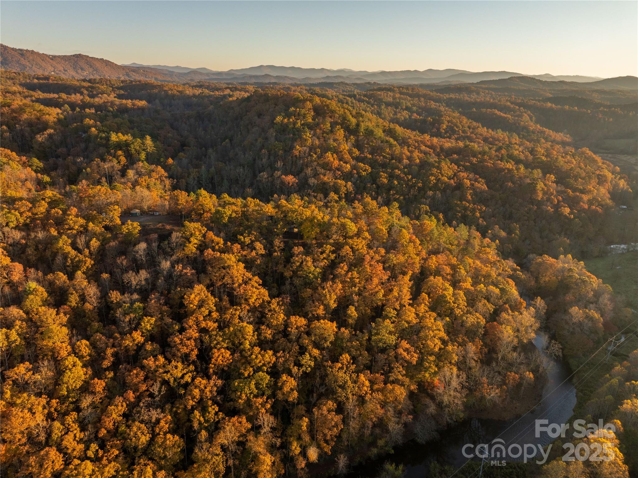 85 Brown Lane Marble, NC 28905 - Photo 6 of 32 a view of a city and mountains